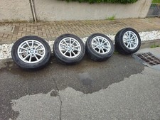 vendo cerchi BMW in ottimo stato 205/60 R16 con gomme invernali usate