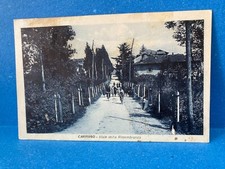 CARTOLINA CARNAGO VIALE DELLA RIMEMBRANZA ANIMATA BICICLETTE VIAGGIATA.
