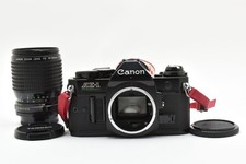 Canon AE-1 Program 35 mm fotocamera reflex pellicola nera con obiettivo FD 35...