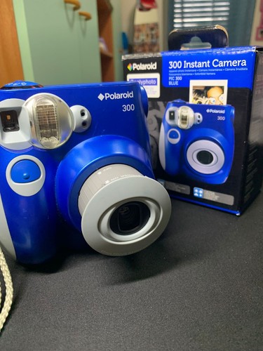 Polaroid 300 instant camera - -,