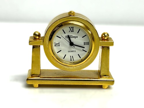 Orologio miniatura - in,