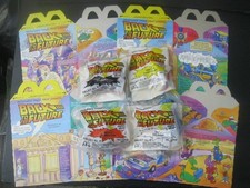 Ritorno al Futuro "Set Completo 4 Giocattoli più 4 Scatole Happy Meal" Nuovo con scatola McDonald's