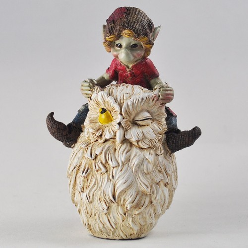 Fairy pixie riding owl - pixie,