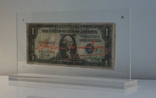 Biglietto firmato Andy Warhol (dopo). venduto incorniciato e con certificato