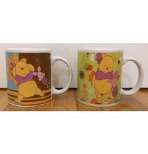 2 COLLECTIBLE CUPS-DISNEY