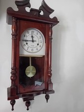 orologio a pendolo da parete