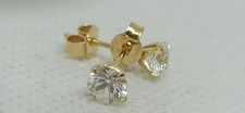 Orecchini punto luce in oro giallo  18 kt  con zircone diametro 5 mm