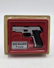 PISTOLE & REVOLVER " SIG SAUER