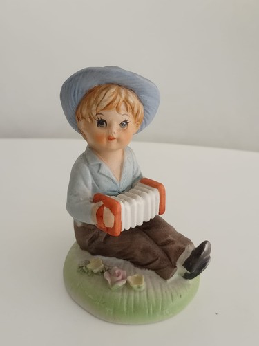Statua bimbo con - statua,