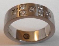 ANELLO INOX con 7 pietre