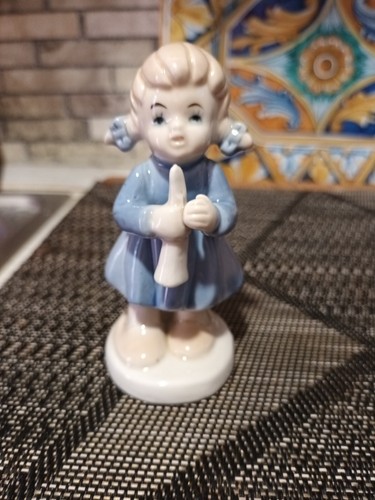 Statuina bimba porcellana - ,