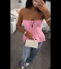 Top Peplum rosa senza spalline