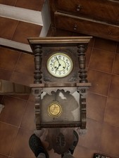 orologio a pendolo da parete