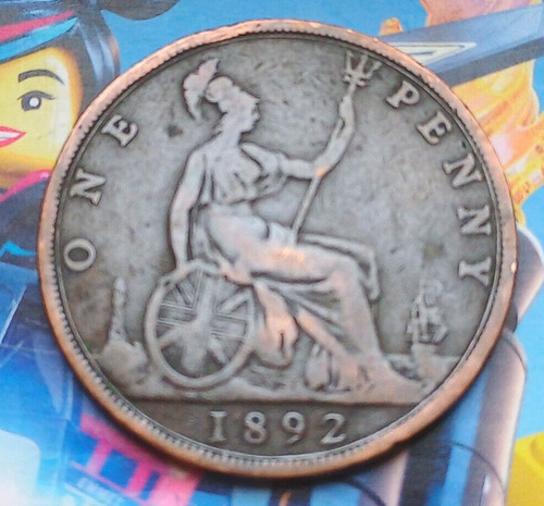 Moneta penny testa - da,