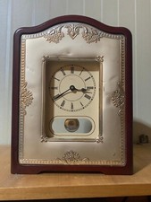Orologio a pendolo vintage in argento vero e retro legno di mogano