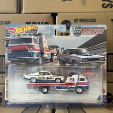 HOT WHEELS Premium Team Transport AMC Rebel Machine