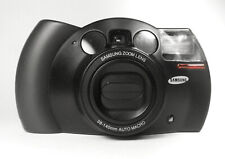 Fotocamera 35 mm  Samsung ECX1 (Kenox FX-4) - Zoom 38/140 mm - Porsche Design