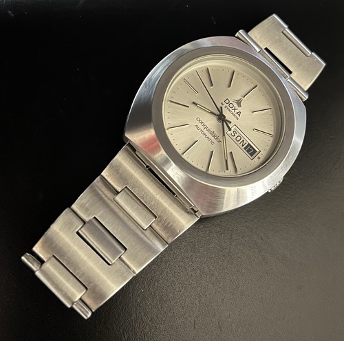 Doxa syncron - by,
