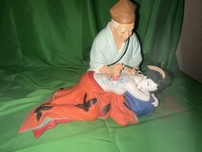 Bambola giapponese tatuatrice