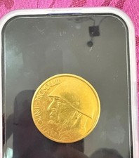 Moneta dorata 100 lire