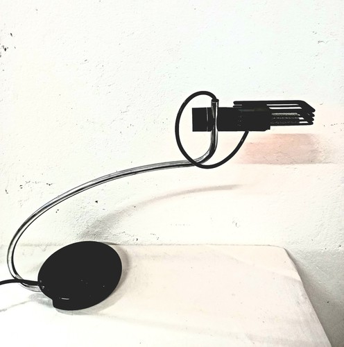 Lampada wing produzione oluce - lampada,