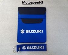 porta documenti suzuki    + portachiavi.