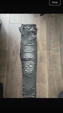 Jeans uomo strappati Supply