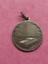 Antica Medaglia in argento S