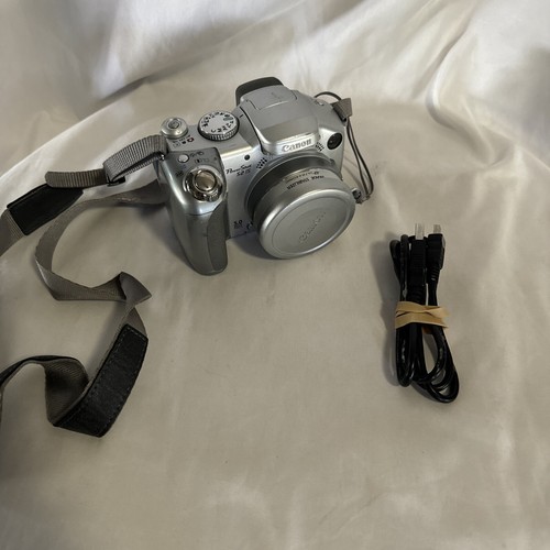 Canon powershot is - canon,