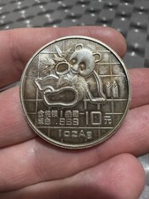 Oncia Panda Cina 10 Yuan 1989