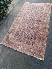 Antico tappeto in lana malese annodato a mano