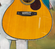 Chitarra acustica gialla OM42