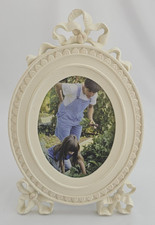 Elegante cornice ovale panna nastro 3D e fiocco bordo perline opaco