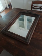 Specchio antico con cornice in noce massello finemente intagliata - Inizio '900