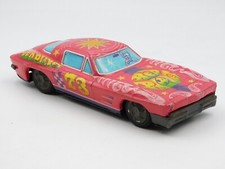 Taiyo Red Planet psichedelic Chevrolet Corvette 60s auto latta tin toy car Japan