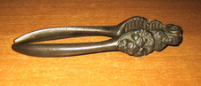 Schiaccianoci antico fine 800 con teste di leone in metallo massiccio - vintage