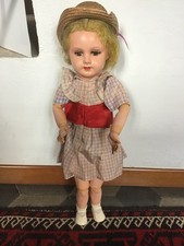 Bambola in compo della Unis