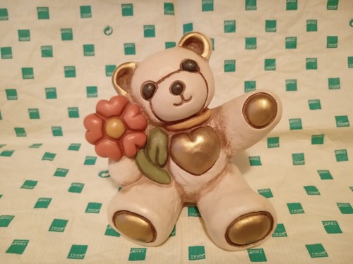 Teddy con fiore arancione - teddy,