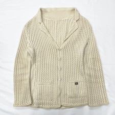 Cardigan Chanel modello popolare giacca con bottoni cocco