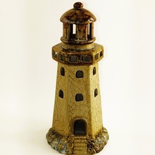 Portacandele faro in ceramica