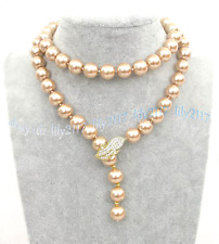 COLLANA LAVORAZIONE PERLE MARI DEL SUD COLOR CHAMPAGNE CM 60 CHIUSURA FOGLIA
