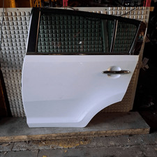 770033W000 Porta post. SX KIA