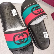 ​Gucci Web Rubber Slides