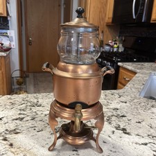 Antico percolatore in rame