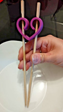 Supporto per bacchette cinesi/