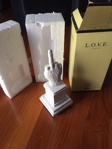 Maurizio cattelan - l.o.v.e.,