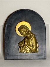 Madonna in plaster bas-relief