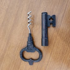 VINTAGE METAL KEY SHAPED CORK
