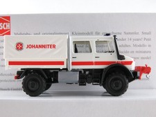 Busch 51084 Mercedes-Benz Unimog U 5023 DoKa P/P (2013) "Johanniter (D)" 1:87/H0