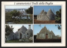 Puglia - Trulli in pietra fra alberi e campagna secca - ITALIA (1999)
